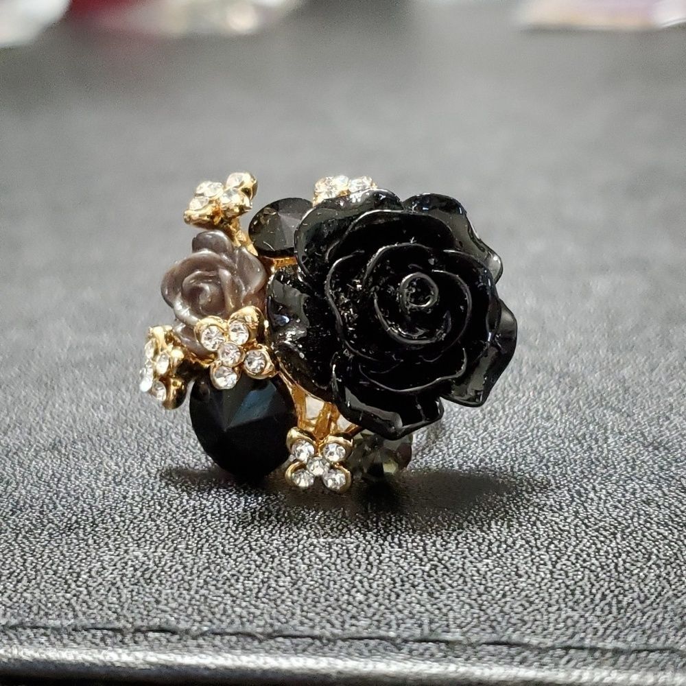 Gold tone black resin rose ring